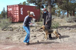 Dr. Any Fousek with dog owner at pup-up dog vaccination and licensing event
