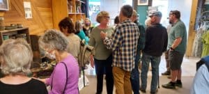 Crowd attending art show, benefitting Rescue Ranch
