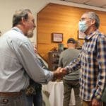 RR Exec Dir John Golay meet artist Leif Voeltz who is donating art show proceeds to Rescue Ranch