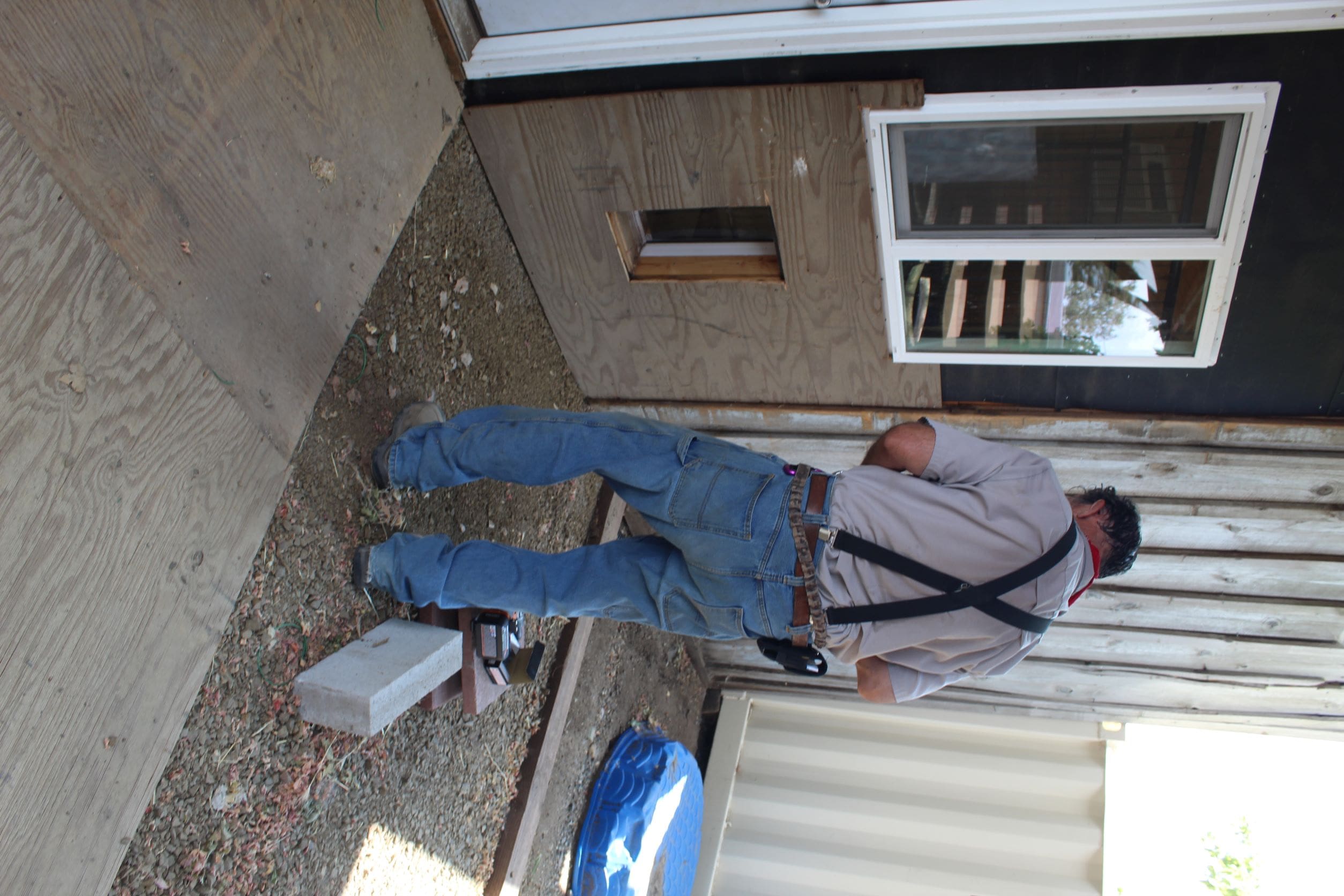 Rescue Ranch Sanctuary, John making a doggy dog for a nursing momma in medical building