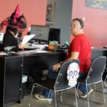 D & S Harley Davidson Pet Day, Harley staff in witches costume with bike customer