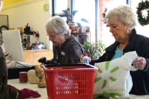 Rescue Ranch Thrift Store interior, Grand opening, staff at checkout counter