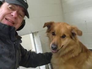 Stray dog, Randi warms to Eric at AC_photo EAnderson