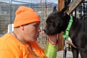 Amazing dog, Benny wants to lick Steven's face