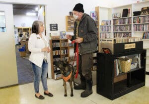 Thrift Store, Bill Chesney and Flores speaking with Jodi Wilson