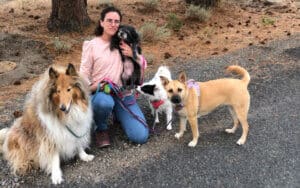 Zoie on walk with new adopttive siblings and AliCarmen Carico