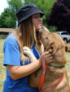 Dog adoptions, Monty kissing Thea