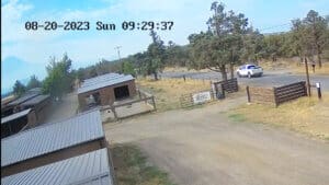 Sequence of John Golay's white truck going through the gate and leaving Sanctuary in the morning