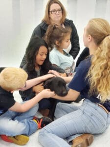 Dog rescues collaborate: Meghan introducing rescue pup to Shatsa kids