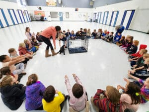 Dog rescues collaborate on presentations to elementary schools