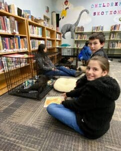 Young girl smiling back at cam