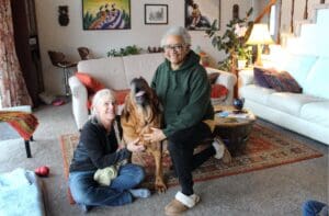 Dog Rescuers_Team shot with Michele, left, and Colette, right and a restless Woody in the center