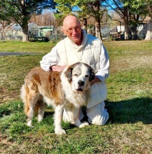 Special Needs St Bernard_Rajiv and Molly posing in the park