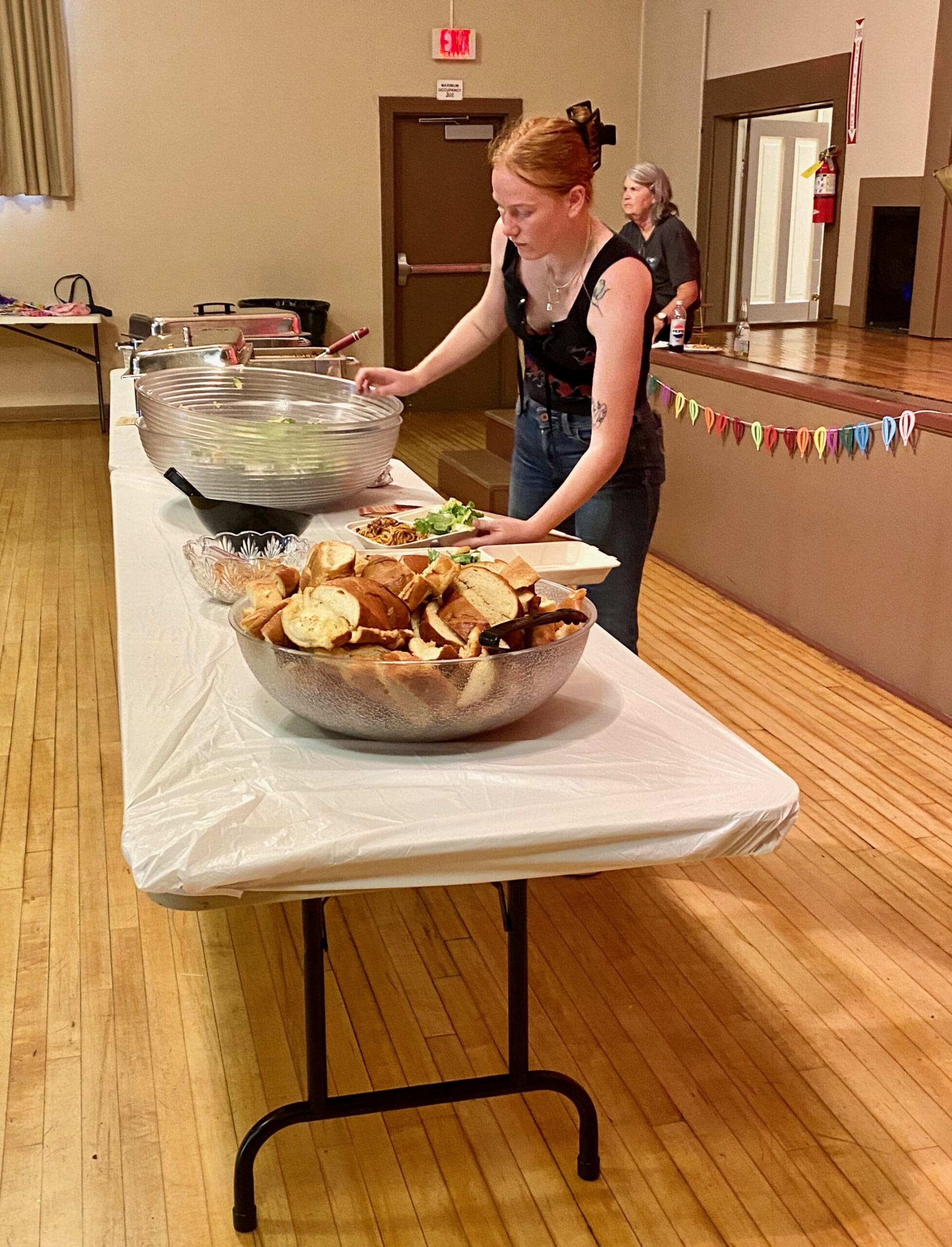 Spaghetti_Feed_fundraiser_Jada_filling_togo